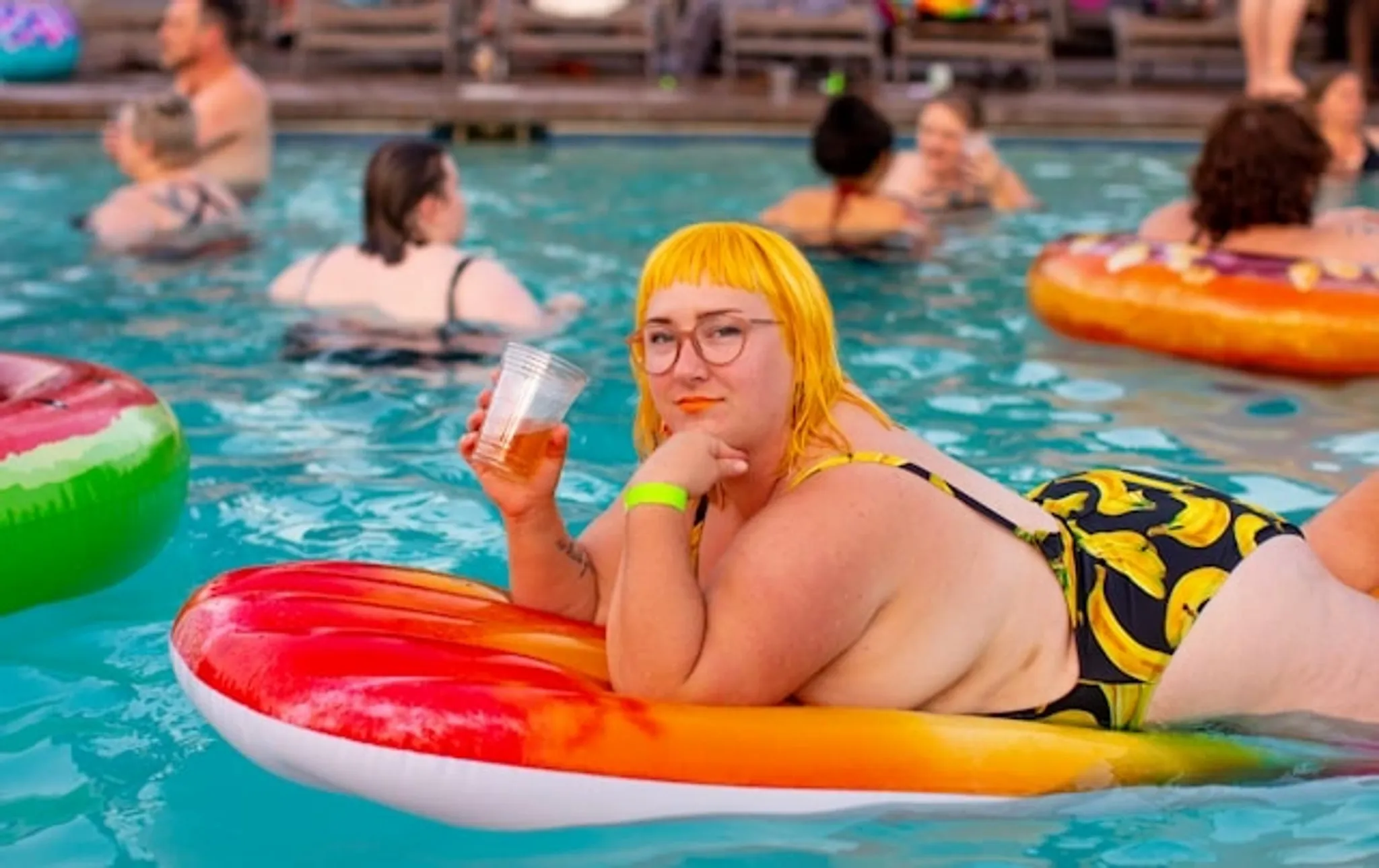 A plus-size woman in the pool