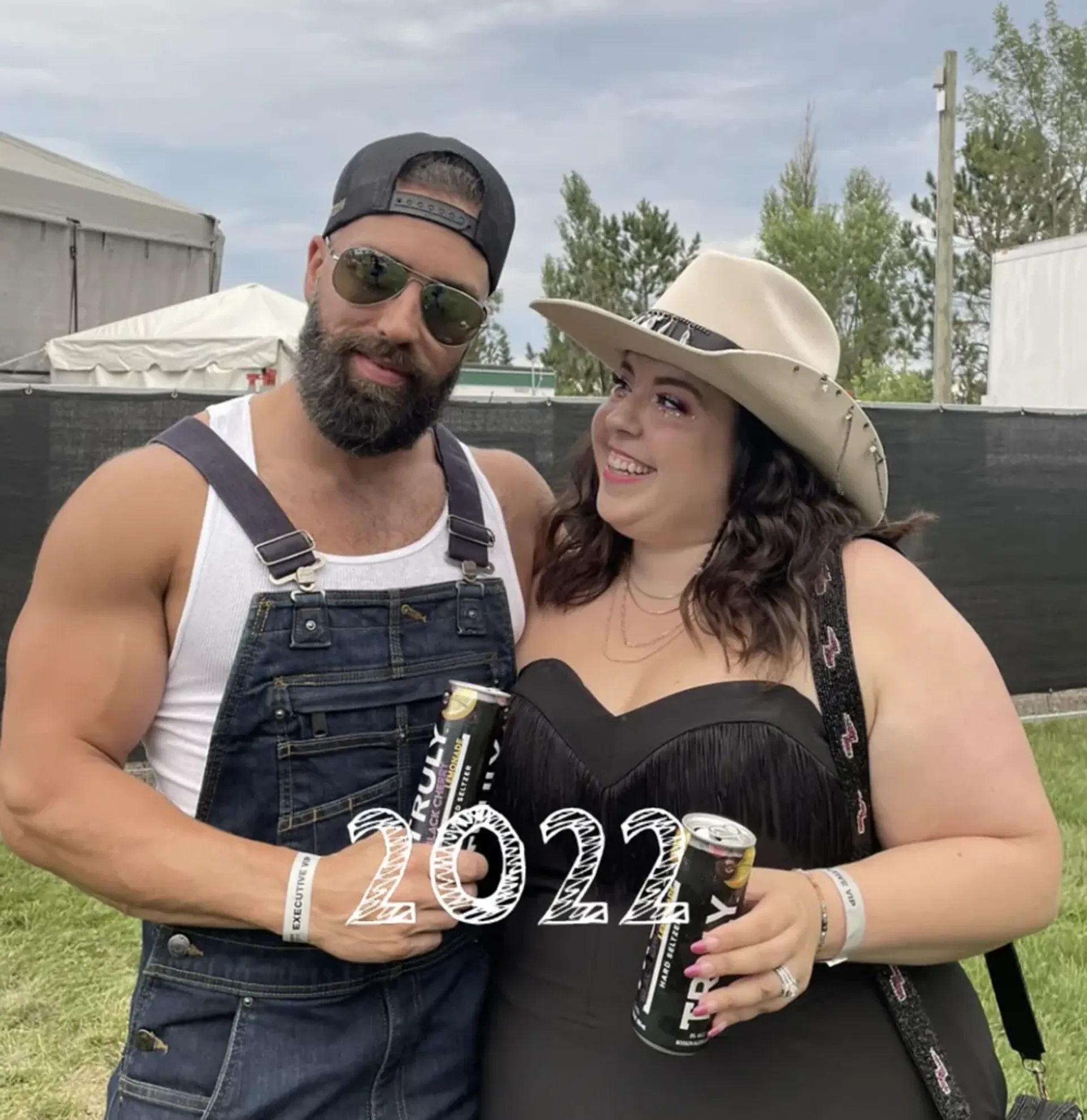 Alicia and Scott Mccarvell smiling together at an outdoor event