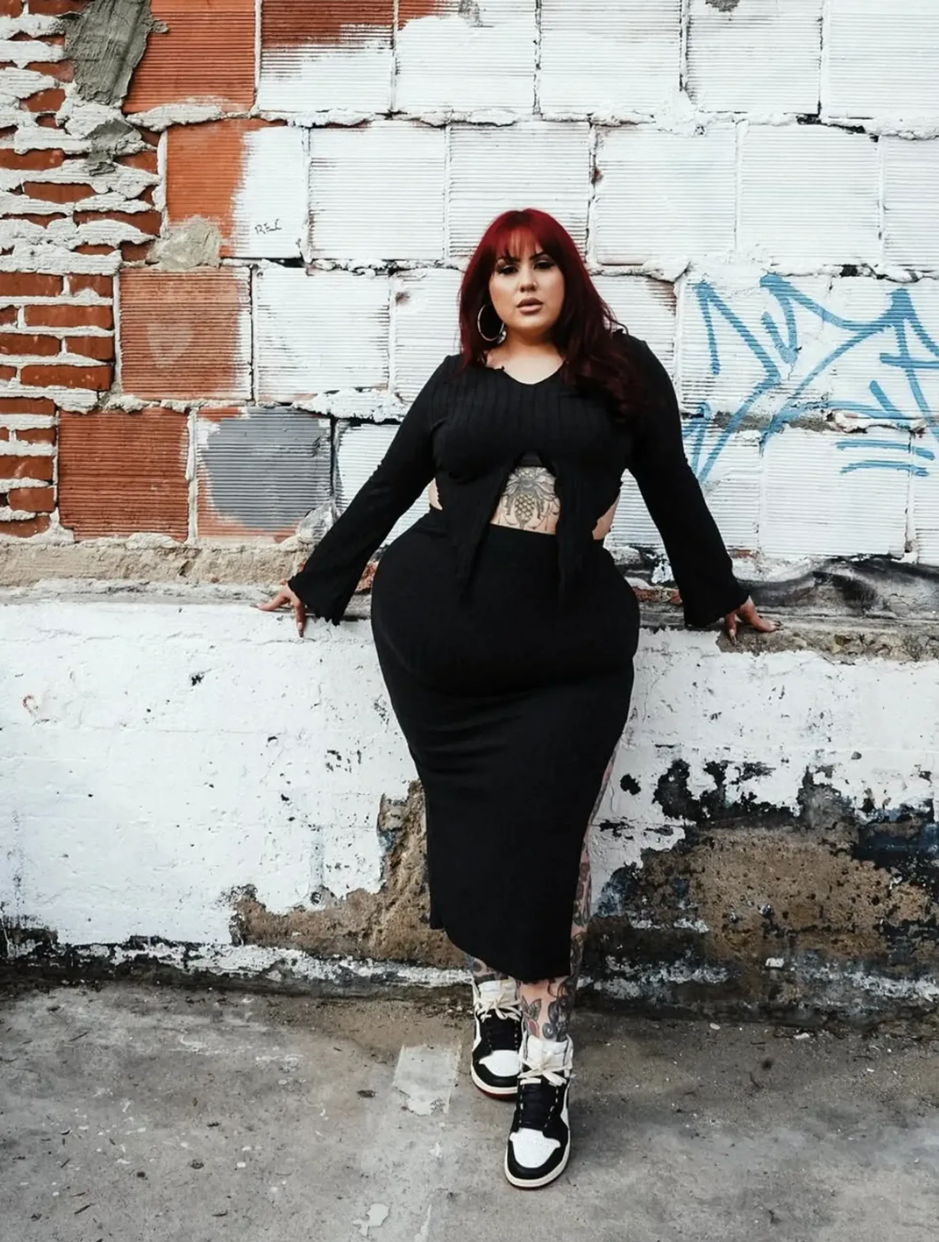 Steph of Glamghoul wearing an edgy black plus-size outfit
