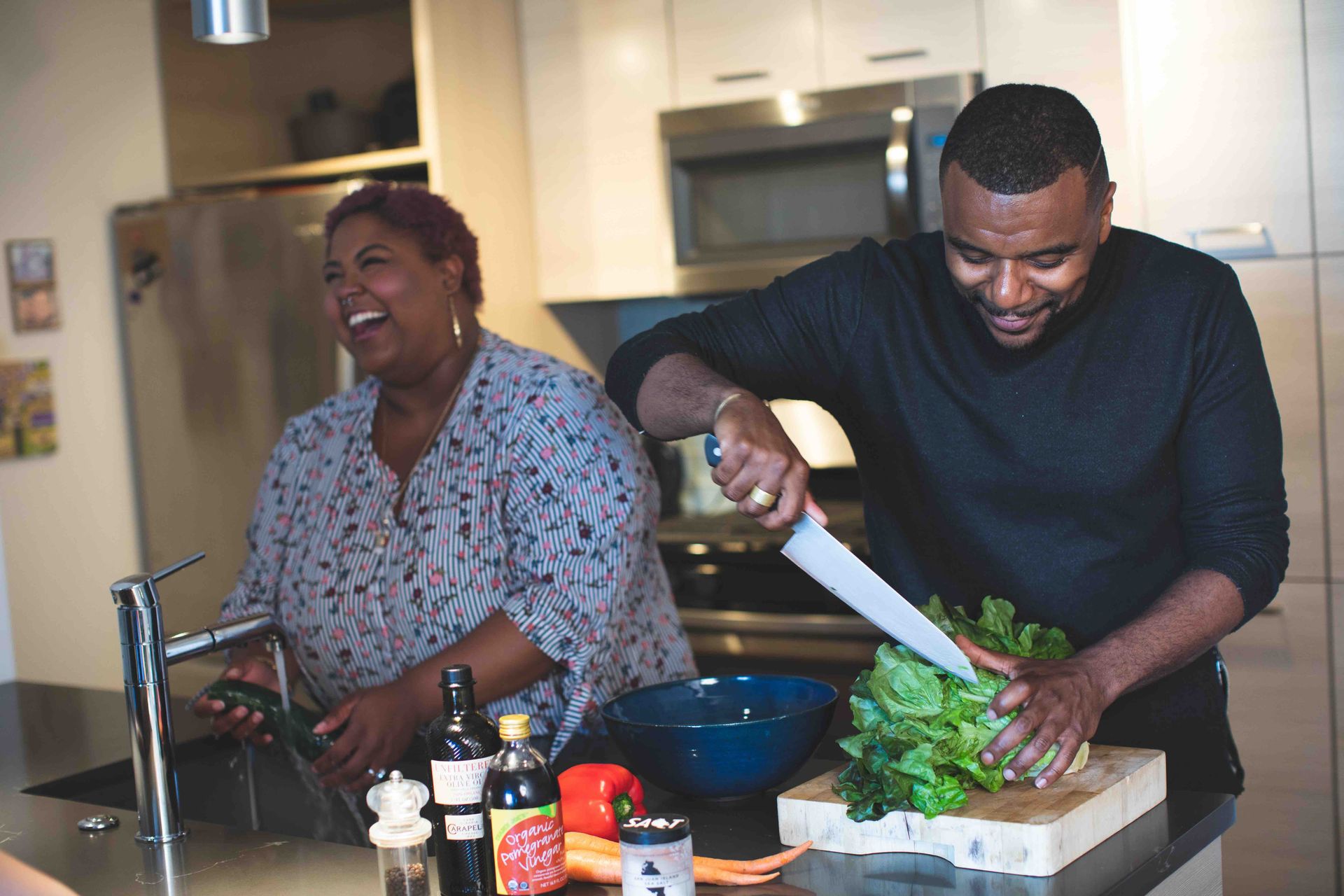 Man and Woman Slicing Vegetable