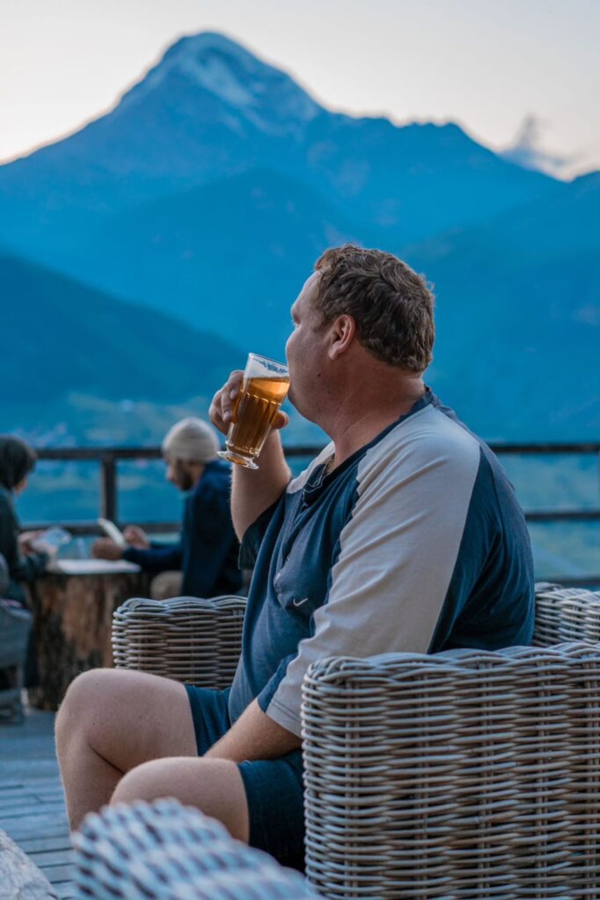 chubby man drinking